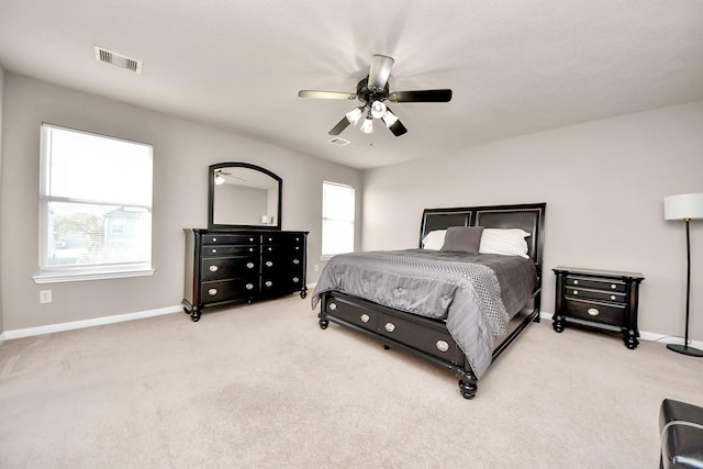 bedroom featuring carpet, visible vents, and baseboards