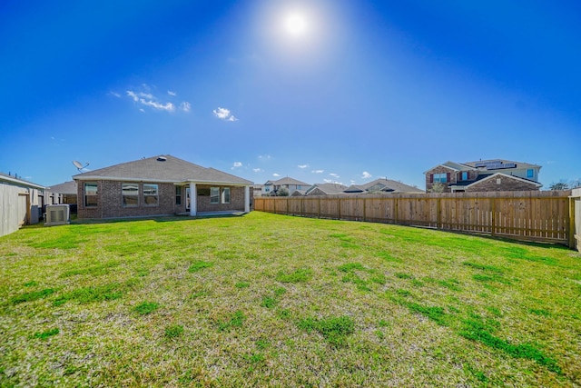 view of yard featuring a fenced backyard