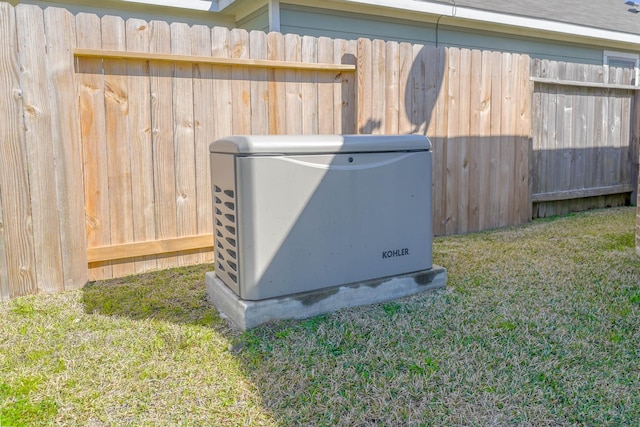 details featuring fence and a power unit