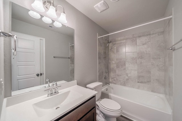 full bath featuring visible vents, bathing tub / shower combination, toilet, vanity, and a notable chandelier