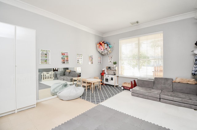 playroom with visible vents and crown molding