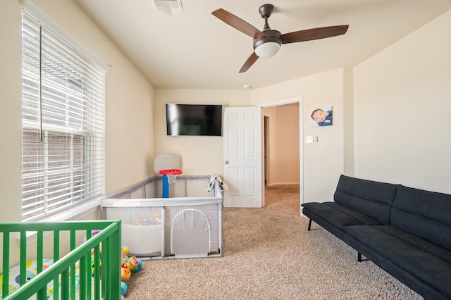 bedroom featuring carpet floors, visible vents, and a ceiling fan