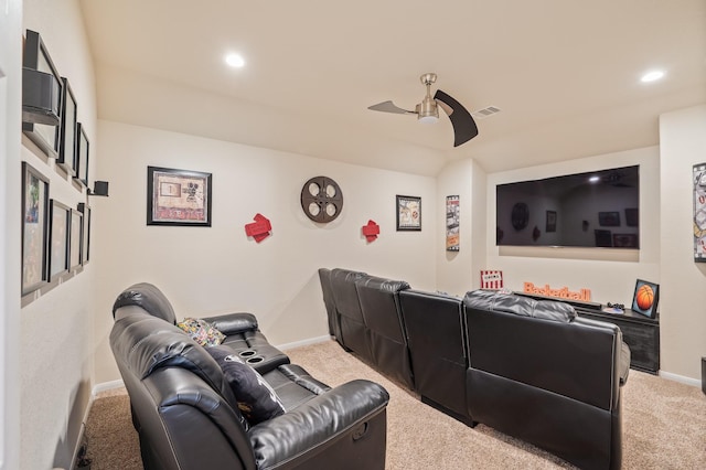 carpeted cinema featuring ceiling fan, recessed lighting, visible vents, and baseboards