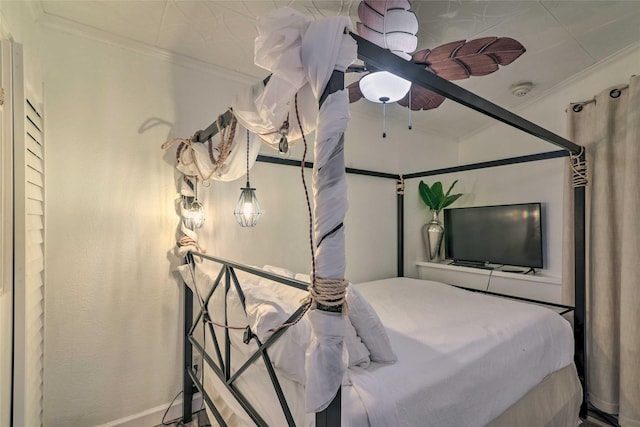 bedroom featuring ornamental molding