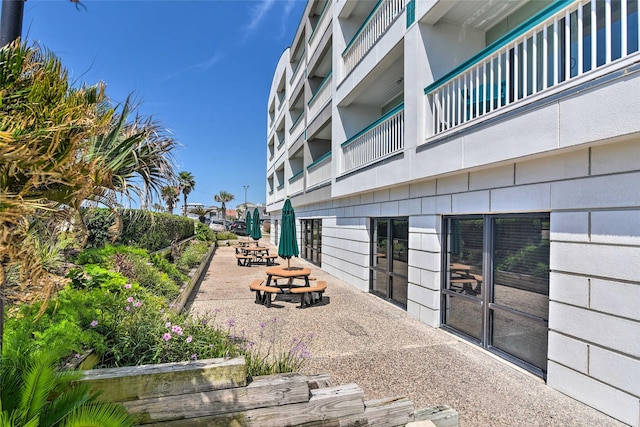 view of home's community with a patio