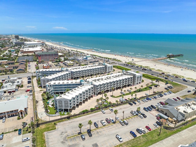 aerial view with a beach view and a water view