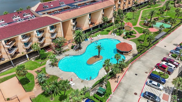 view of pool with a water view