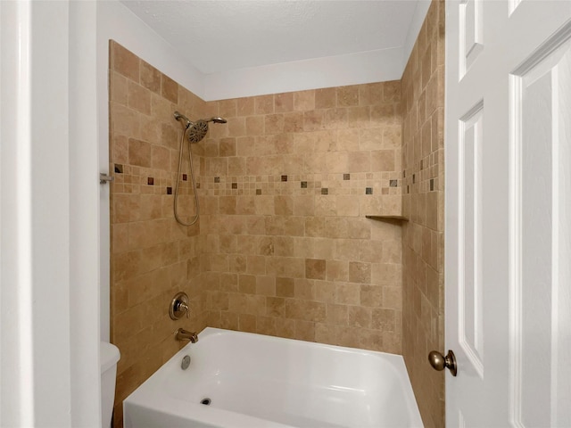 full bathroom featuring  shower combination and toilet