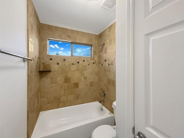 bathroom featuring shower / washtub combination, visible vents, and toilet