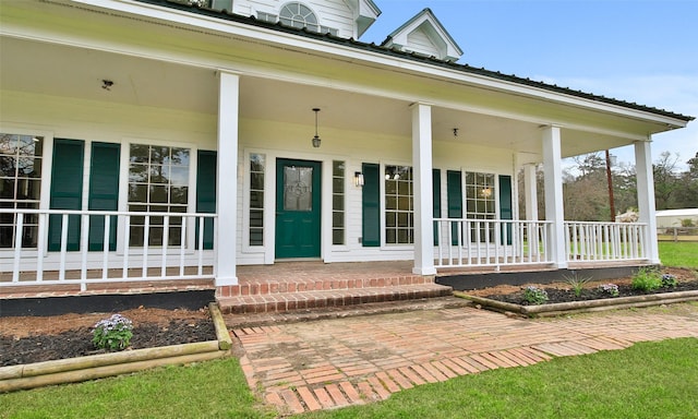 property entrance with a porch