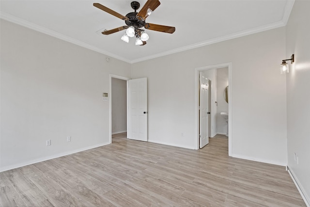 unfurnished bedroom featuring ensuite bathroom, light wood-type flooring, baseboards, and ornamental molding