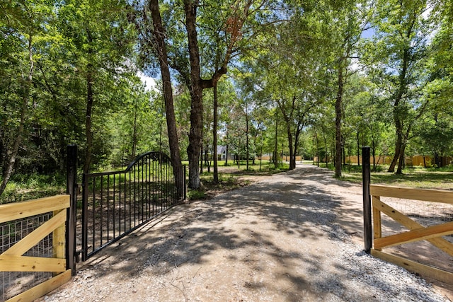 exterior space featuring a gate