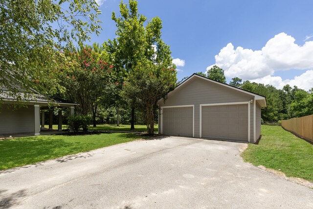 detached garage with fence