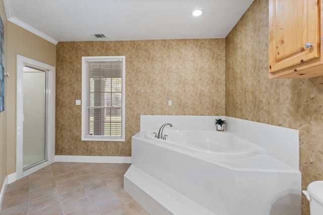 bathroom with baseboards, visible vents, a garden tub, toilet, and tile patterned floors