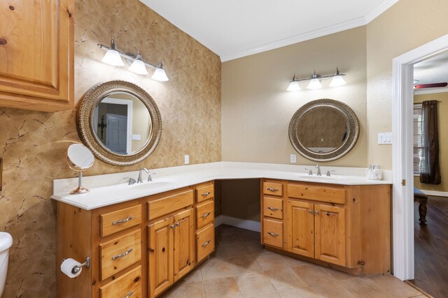full bath featuring ornamental molding, vanity, and tile patterned flooring