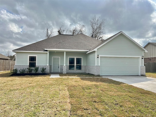 view of front of house with driveway, an attached garage, fence, a front lawn, and brick siding