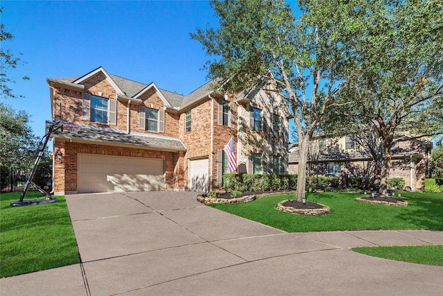 view of front of house with a garage, driveway, a front lawn, and brick siding