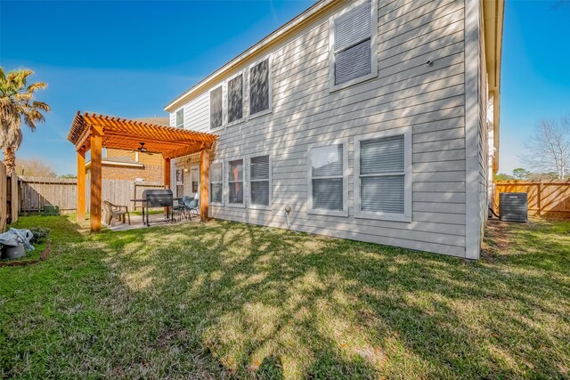 9314 Dune Gate Ct, Humble, TX 77396 - rear view of property featuring a pergola, a fenced backyard, and a patio