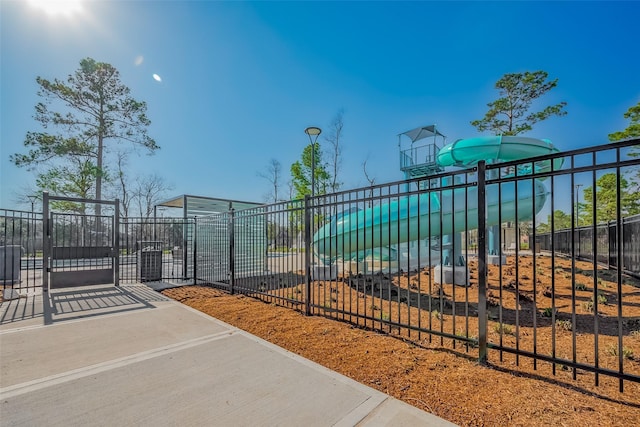 surrounding community featuring fence