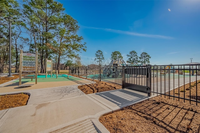 view of property's community featuring fence