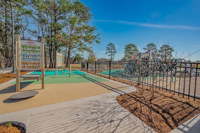 view of property's community with fence