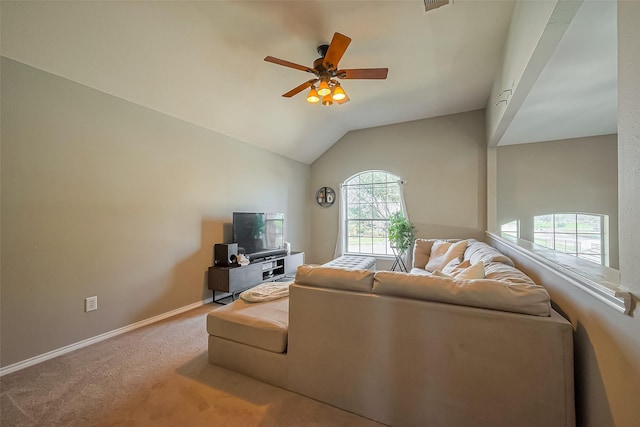 9314 Dune Gate Ct, Humble, TX 77396 - carpeted living room featuring a ceiling fan and vaulted ceiling