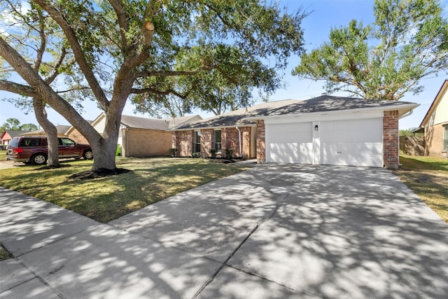 ranch-style home with a garage, concrete driveway, brick siding, and a front lawn