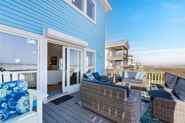 deck featuring outdoor lounge area