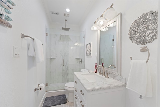 bathroom featuring a marble finish shower, visible vents, toilet, ornamental molding, and vanity