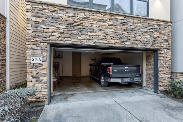 garage featuring driveway