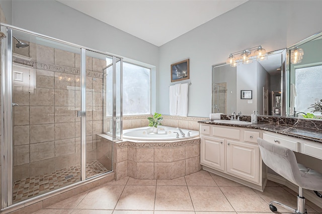 full bathroom with tile patterned flooring, a shower stall, vanity, and a bath