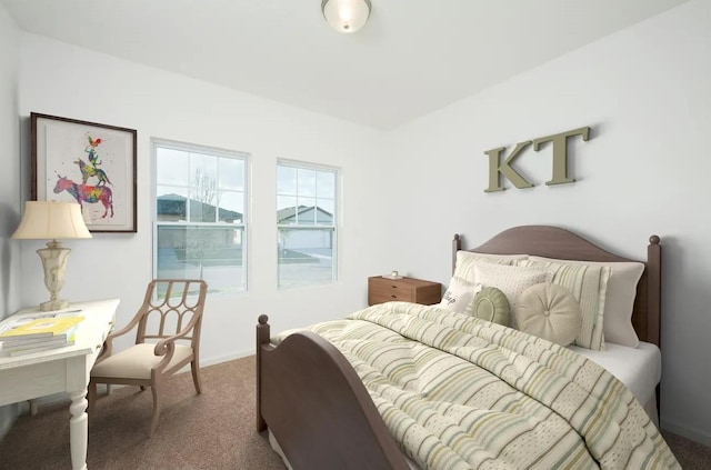 bedroom with carpet flooring and baseboards