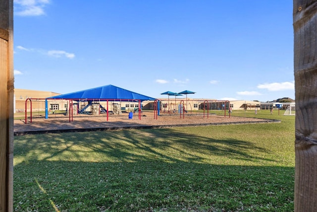 community playground featuring a lawn