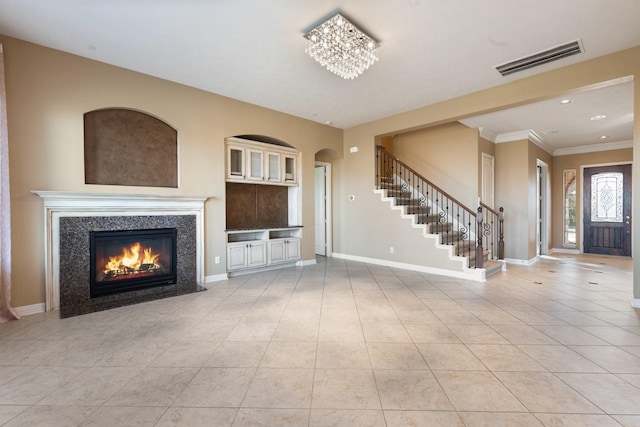 unfurnished living room with light tile patterned floors, recessed lighting, visible vents, baseboards, and stairway