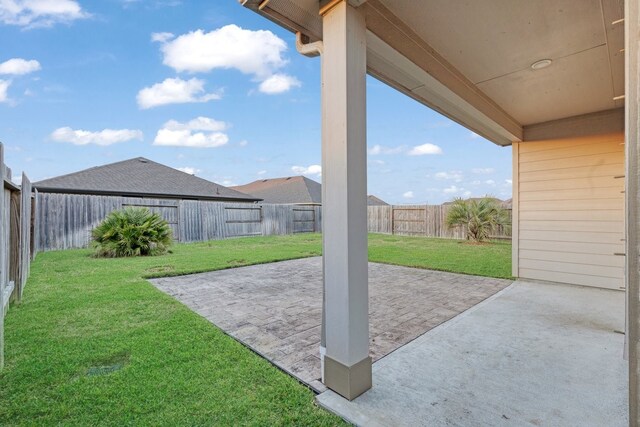 view of patio with a fenced backyard