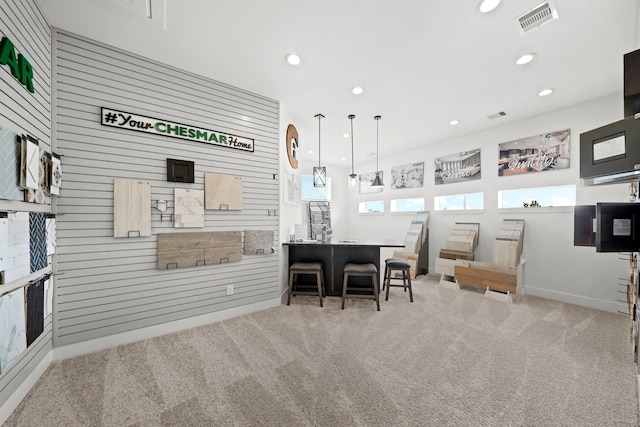 kitchen featuring carpet, visible vents, and recessed lighting