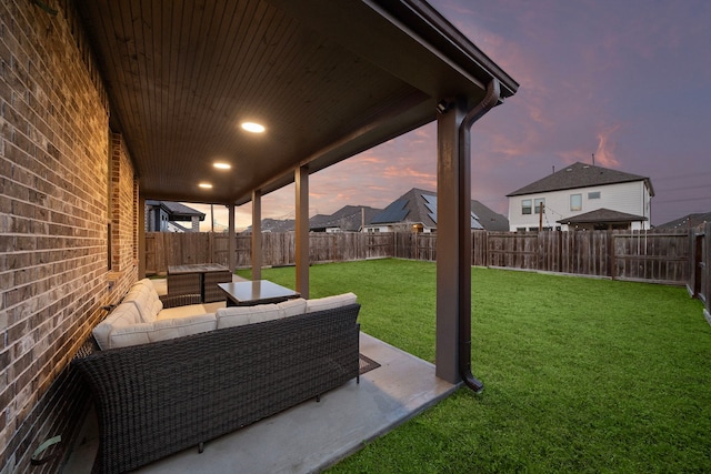 view of yard with a fenced backyard, outdoor lounge area, and a patio