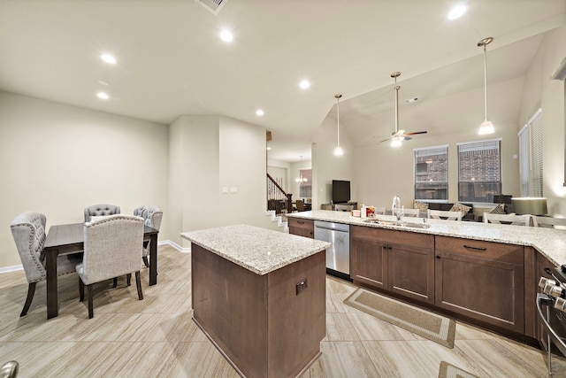 kitchen featuring dark brown cabinets, a kitchen island, open floor plan, stainless steel dishwasher, and a sink