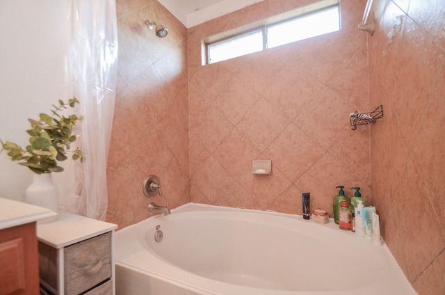 full bathroom featuring vanity and shower / tub combo with curtain