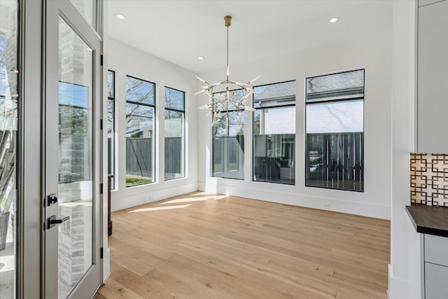 interior space featuring a notable chandelier