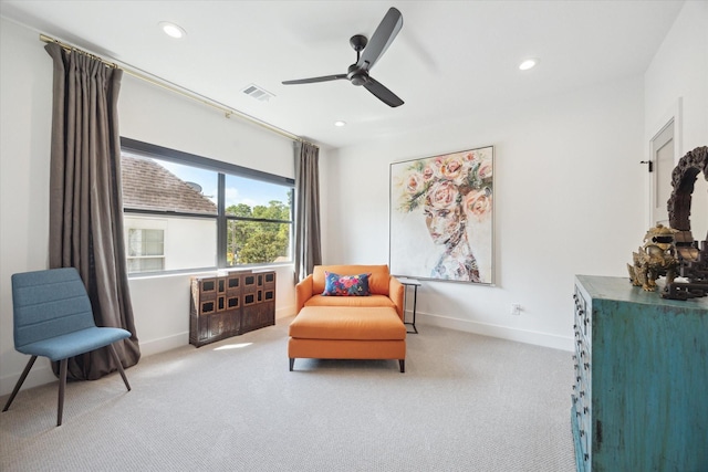 sitting room featuring baseboards, visible vents, carpet flooring, and recessed lighting