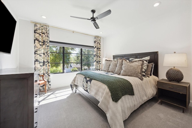 bedroom featuring carpet, a ceiling fan, and recessed lighting