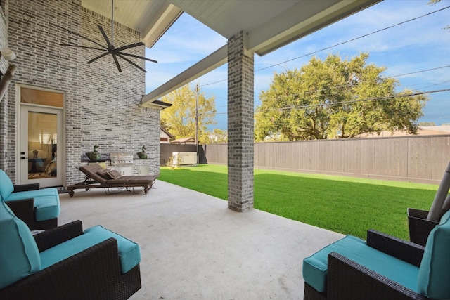 view of patio / terrace featuring outdoor lounge area and a fenced backyard