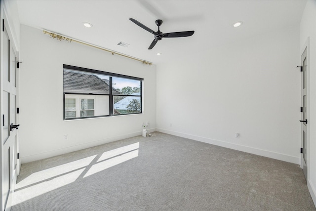 empty room with a ceiling fan, carpet, baseboards, and recessed lighting