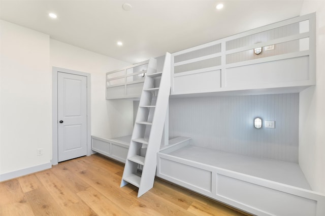 mudroom featuring light wood-type flooring and recessed lighting