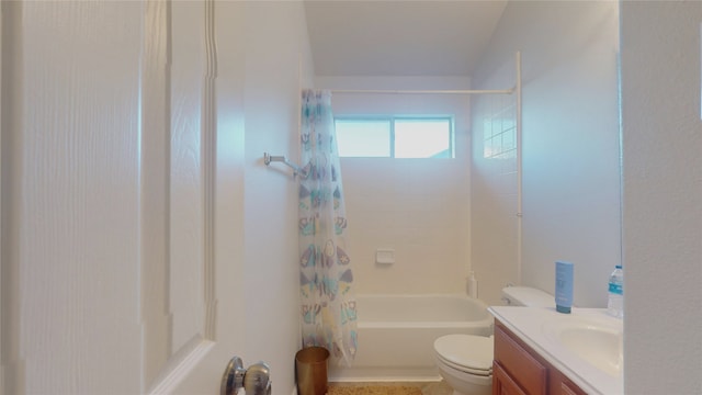 full bathroom with shower / bath combination with curtain, toilet, and vanity