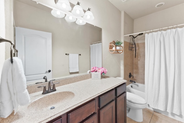 bathroom with shower / bath combination with curtain, tile patterned flooring, vanity, and toilet