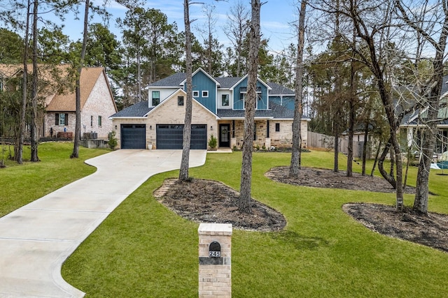 view of front of house with a garage, fence, concrete driveway, stone siding, and a front lawn