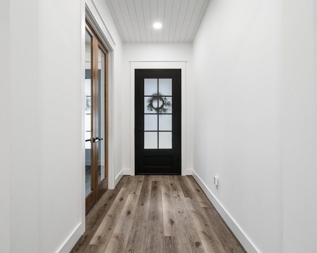245 E Blue Heron Dr, Montgomery, TX 77316 - doorway featuring wood finished floors, recessed lighting, and wooden ceiling