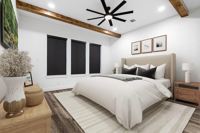 bedroom featuring visible vents, a ceiling fan, wood finished floors, beam ceiling, and recessed lighting